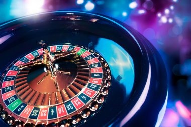 Fishing game interface beside live casino table layout on mobile